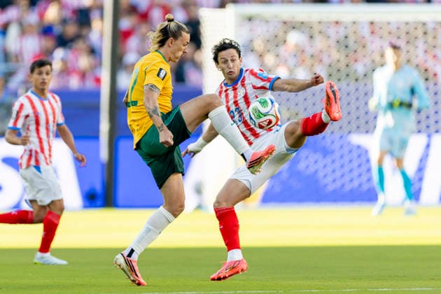 SANTA CLARA, CA - JUNE 25: Jackson Irvine 22 of Australia and Matias Galarza 23 of Paraguay fight for the ball during the FIFA World Cup, WM, Weltmeisterschaft, Fussball Group D match between Paraguay and Australia on June 25, 2026 at San Francisco Bay Area Stadium in Santa Clara, CA. (Photo by Bob Kupbens Icon Sportswire) SOCCER: JUN 25 FIFA World Cup 26 Group D - Paraguay vs Australia EDITORIAL USE ONLY Icon260625010