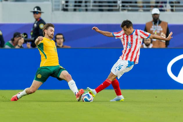 SANTA CLARA, CA - JUNE 25: Conor Metcalfe 8 of Australia and Andres Cubas 14 of Paraguay fight for the ball during the FIFA World Cup, WM, Weltmeisterschaft, Fussball Group D match between Paraguay and Australia on June 25, 2026 at San Francisco Bay Area Stadium in Santa Clara, CA. (Photo by Bob Kupbens Icon Sportswire) SOCCER: JUN 25 FIFA World Cup 26 Group D - Paraguay vs Australia EDITORIAL USE ONLY Icon260625019