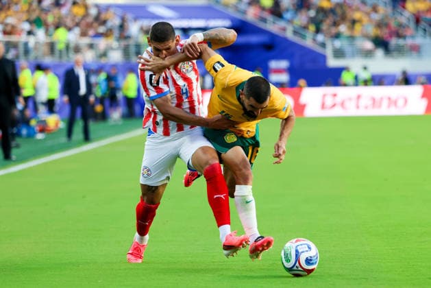 June 25, 2026, Santa Clara, California, USA: Santa Clara, USA - June 25 2026: Juan Jose CoÂ¡ceres 4 of Paraguay and Aziz Behwich 16 of Australia during a FIFA World Cup, WM, Weltmeisterschaft, Fussball group match between Paraguay and Australia at San Francisco Bay Area Stadium World Cup 2026: Group D: Paraguay Vs Australia  - ZUMAp121 20260625_zsp_p121_034 Copyright: xChrisxPutnamx