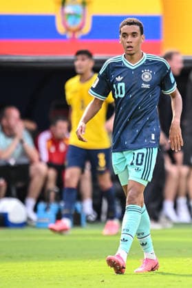 Jamal Musiala (Germany) Looks on during the FIFA World Cup, WM, Weltmeisterschaft, Fussball 2026 Group E match between Ecuador and Germany at New York New Jersey Stadium on June 25, 2026 in East Rutherford, United States. (Photo by Harry Langer DeFodi Images) - *** Jamal Musiala of Germany watches as Ecuador and Germany face off in a Group E match of the 2026 FIFA World Cup at New York New Jersey Stadium on June 25, 2026, in East Rutherford, United States. Photo by Harry Langer, DeFodi Images