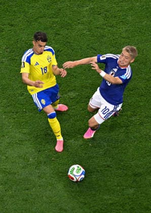 (260626) -- DALLAS, June 26, 2026 -- Doan Ritsu (R) of Japan vies with Yasin Ayari of Sweden during the group F match between Japan and Sweden at the 2026 FIFA World Cup, WM, Weltmeisterschaft, Fussball at Dallas Stadium in Dallas, the United States, on June 25, 2026. ) (SP)U.S.-DALLAS-FOOTBALL-FIFA WORLD CUP-GROUP F-JPN VS SWE ChengxMin 