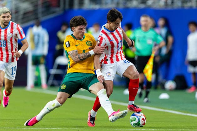 SANTA CLARA, CA - JUNE 25: Jordan Bos 5 of Australia and Matias Galarza 23 of Paraguay battle for the ball during the FIFA World Cup, WM, Weltmeisterschaft, Fussball 2026 Group D match between Paraguay and Australia on June 25, 2026 at San Francisco Bay Area Stadium in Santa Clara, CA. (Photo by Matthew Huang Icon Sportswire) SOCCER: JUN 25 FIFA World Cup 26 Group D - Paraguay vs Australia EDITORIAL USE ONLY Icon260625013