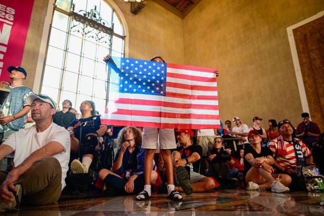 CA: Los Angeles World Cup 26 Fan Zone at The Heart of the City: Los Angeles Union Station A child holds an American flag during the World Cup 26 Fan Zone at The Heart of the City at Los Angeles Union Station on June 25, 2026, in Los Angeles, California. The free public fan zone featured live match broadcasts, entertainment, food, and interactive activities throughout the FIFA World Cup, WM, Weltmeisterschaft, Fussball 2026. Los Angeles United States Copyright: xWestonxHancockx xSOPAxImagesx Weston Hancock June 25 - 1979