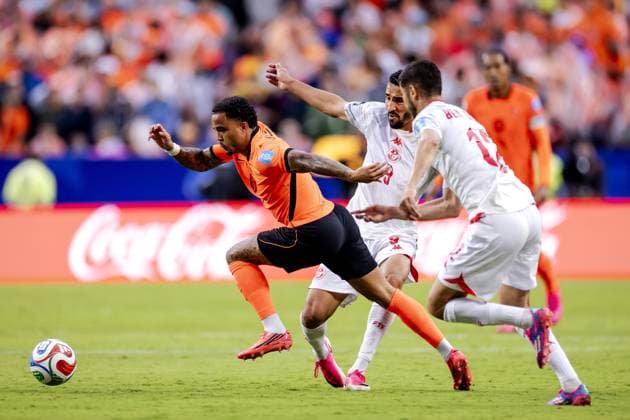 KANSAS - Justin Kluivert for the Netherlands, Hazem Mastouri for Tunisia, and Mortadha Ben Ouanes for Tunisia during the 2026 FIFA World Cup, WM, Weltmeisterschaft, Fussball Group F match between Tunisia and the Netherlands at Kansas City Stadium on June 25, 2026, in Kansas, United States. ROBIN VAN LONKHUIJSEN ANP FIFA World Cup 2026 group stage 2026 xVIxANPxSportx xxANPxIVx 562019532 originalFilename: 562019532.jpg