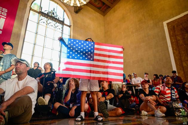 CA: Los Angeles World Cup 26 Fan Zone at The Heart of the City: Los Angeles Union Station A child holds an American flag during the World Cup 26 Fan Zone at The Heart of the City at Los Angeles Union Station on June 25, 2026, in Los Angeles, California. The free public fan zone featured live match broadcasts, entertainment, food, and interactive activities throughout the FIFA World Cup, WM, Weltmeisterschaft, Fussball 2026. Los Angeles United States Copyright: xWestonxHancockx xSOPAxImagesx Weston Hancock June 25 - 1980