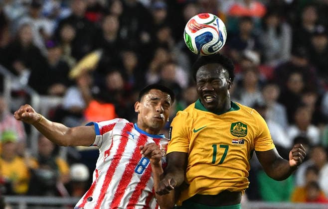 (260626) -- SAN FRANCISCO, June 26, 2026 -- Diego Gomez (L) of Paraguay and Nestory Irankunda of Australia fight for a head ball during the group D match between Paraguay and Australia at the 2026 FIFA World Cup, WM, Weltmeisterschaft, Fussball at San Francisco Bay Area Stadium in San Francisco, the United States, June 25, 2026. (Photo by Xinhua) (SP)U.S.-SAN FRANCISCO-FOOTBALL-FIFA WORLD CUP-GROUP D-PRY VS AUS ZiyuxJulianxZhu 