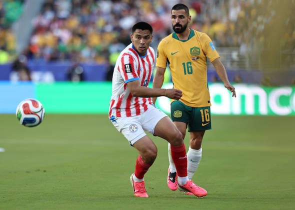 (260626) -- SAN FRANCISCO, June 26, 2026 -- Diego Gomez (L) of Paraguay vies with Aziz Behich of Australia during the group D match between Paraguay and Australia at the 2026 FIFA World Cup, WM, Weltmeisterschaft, Fussball at San Francisco Bay Area Stadium in San Francisco, the United States, June 25, 2026. (Photo by Xinhua) (SP)U.S.-SAN FRANCISCO-FOOTBALL-FIFA WORLD CUP-GROUP D-PRY VS AUS SongxHaiyuan 
