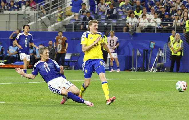 Football: 2026 World Cup Japan s Daizen Maeda (L) scores the opening goal in the second half of a World Cup Group F football match against Sweden at Dallas Stadium in Arlington, Texas, on June 25, 2026.  A14AA0005620251P