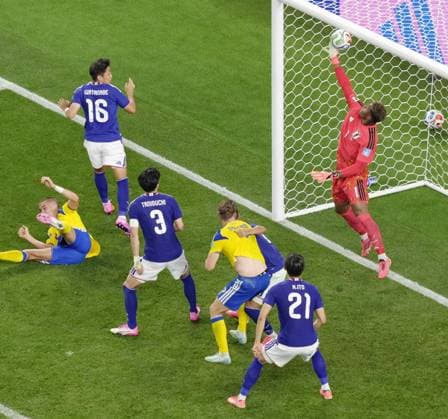Football: 2026 World Cup Japan goalkeeper Zion Suzuki (far R) makes a save during the second half of a World Cup Group F football match against Sweden at Dallas Stadium in Arlington, Texas, on June 25, 2026.  A14AA0005620277P