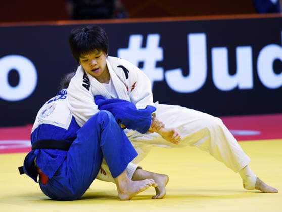 (260626) -- QINGDAO, June 26, 2026 -- Hui Xinran (R) of China competes against Vorobeva Marina of Russia during the women s -48kg bronze medal match at the IJF World Judo Tour Qingdao Grand Prix 2026 in Qingdao, east China s Shandong Province, June 26, 2026. ) (SP)CHINA-QINGDAO-JUDO-GRAND PRIX 2026(CN) LixZiheng 