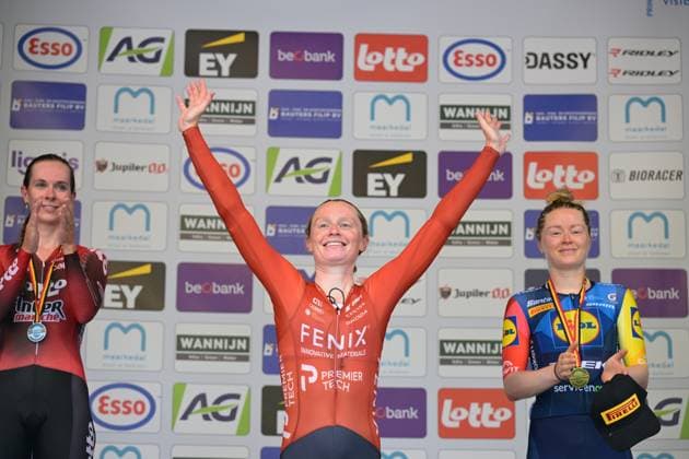 L-R, second Elite Women Sandrine Tas, winner Belgian champion Elite Women Lotte Claes and third Elite Women Margot Vanpachtenbeke celebrate on the podium of the women s elite individual road time trial race (20,5km) at the Belgian Cycling Championships, in Maarkedal, on Friday 26 June 2026. DAVIDxPINTENS  x179394076x