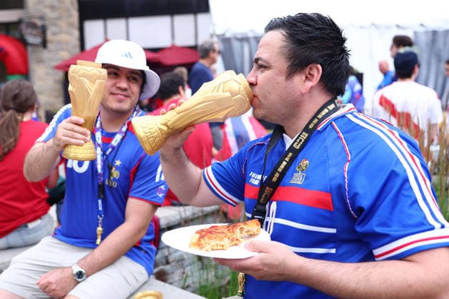 Foxborough, USA, 26th June 2026. France fans drink from World Cup replica shaped cups before the Norway vs France FIFA World Cup, WM, Weltmeisterschaft, Fussball match at Gillette Stadium, Foxborough. Picture credit should read: Paul Terry Sportimage EDITORIAL USE ONLY. No use with unauthorised audio, video, data, fixture lists, club league logos or live services. Online in-match use limited to 120 images, no video emulation. No use in betting, games or single club league player publications. SPI_021_PT_Norway_France SPI-4842-0021