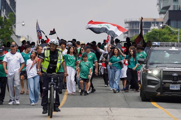 Senegal v Iraq - 2026 FIFA World Cup, WM, Weltmeisterschaft, Fussball Group I Iraqi fans arriving to the Toronto stadium before the 2026 FIFA World Cup Group I match between Senegal and Iraq at Toronto Stadium. on June 26, 2026 in Toronto, Canada. (Photo by Leonardo Ramirez Eyepix Group) Copyright: xLeonardoxRamirezx xEyepixxGroupx LR26062026-09761