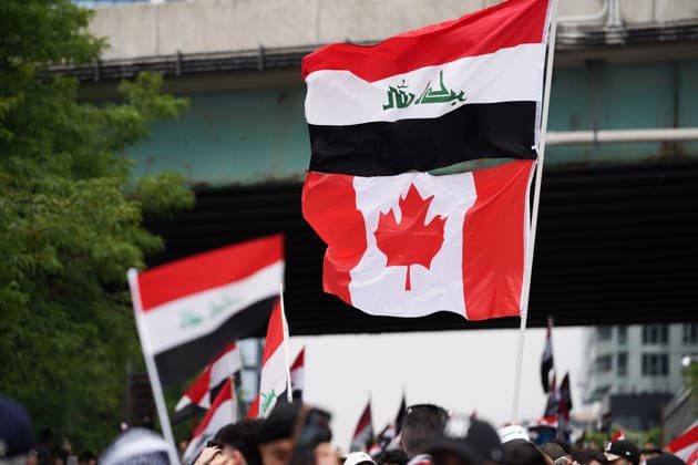 Senegal v Iraq - 2026 FIFA World Cup, WM, Weltmeisterschaft, Fussball Group I Iraqi fans waving Canada and Iraq flags while arriving to the Toronto stadium before the 2026 FIFA World Cup Group I match between Senegal and Iraq at Toronto Stadium. on June 26, 2026 in Toronto, Canada. (Photo by Leonardo Ramirez Eyepix Group) Copyright: xLeonardoxRamirezx xEyepixxGroupx LR26062026-09836