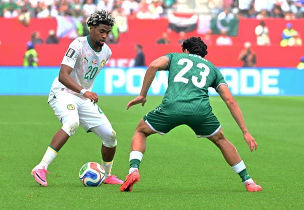 RECORD DATE NOT STATED FIFA World Cup, WM, Weltmeisterschaft, Fussball 2026 - Group I - Senegal vs Iraq Ibrahim Mbaye of Senegal (L) and Merchas Doski of Iraq in action during the FIFA World Cup 2026 group stage match Senegal against Iraq, in Toronto, Canada, 26 June 2026. TORONTO United States  Copyright: xEDUARDOxLIMAx