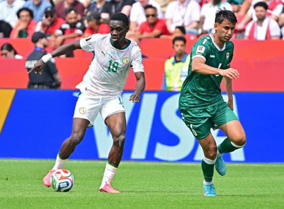 RECORD DATE NOT STATED FIFA World Cup, WM, Weltmeisterschaft, Fussball 2026 - Group I - Senegal vs Iraq Ismaila Sarr of Senegal (L) and Zaid Tahseen of Iraq in action during the FIFA World Cup 2026 group stage match Senegal against Iraq, in Toronto, Canada, 26 June 2026. TORONTO United States  Copyright: xEDUARDOxLIMAx
