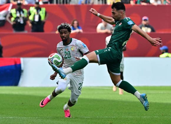 RECORD DATE NOT STATED FIFA World Cup, WM, Weltmeisterschaft, Fussball 2026 - Group I - Senegal vs Iraq Ibrahim Mbaye of Senegal (L) Frans Putros of Iraq in action during the FIFA World Cup 2026 group stage match Senegal against Iraq, in Toronto, Canada, 26 June 2026. TORONTO United States  Copyright: xEDUARDOxLIMAx