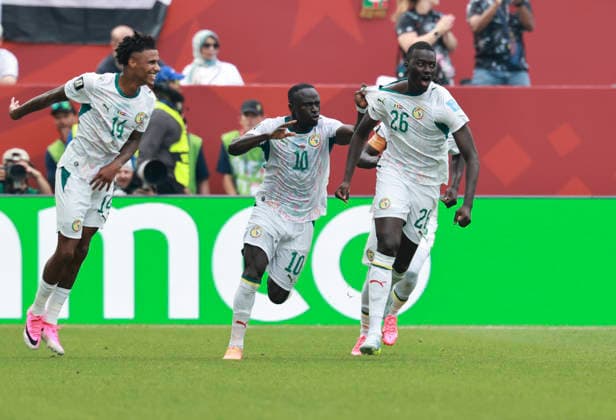 (260627) -- TORONTO, June 27, 2026 -- Senegal s Pape Gueye (R) celebrates scoring their fourth goal during the group I match between Senegal and Iraq at the 2026 FIFA World Cup, WM, Weltmeisterschaft, Fussball at Toronto Stadium in Toronto, Canada, June 26, 2026. (Photo by Xinhua) (SP)CANADA-TORONTO-FOOTBALL-FIFA WORLD CUP-GROUP I-SEN VS IRQ YangxShu 