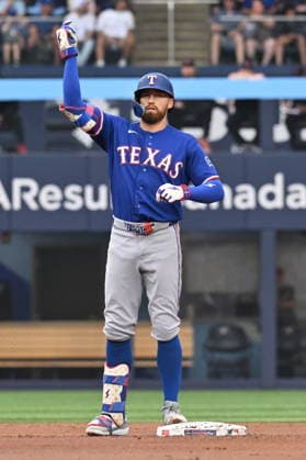 June 26, 2026, Toronto, On, Canada: Texas Rangers Brandon Nimmo (24) gestures to the dugout after hitting an RBI-double against the Toronto Blue Jays during first inning MLB, Baseball Herren, USA baseball action in Toronto on Friday June 26, 2026. Canada News - June 26, 2026  - ZUMAc35_ 20260626_zaf_c35_251 Copyright: xJonxBlackerx