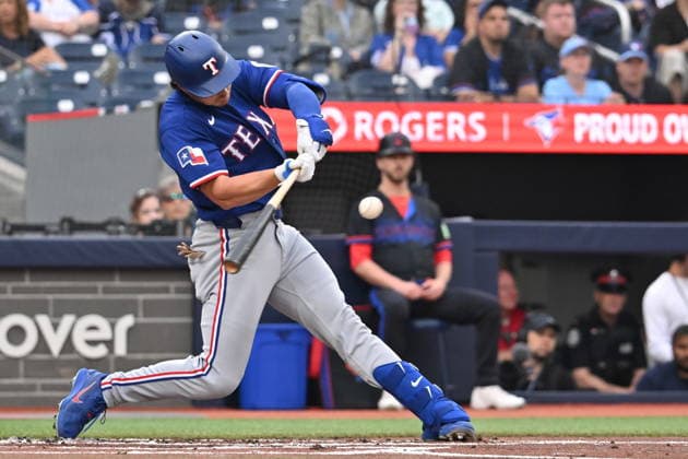 June 26, 2026, Toronto, On, Canada: Texas Rangers designated hitter Justin Foscue (14) hits an RBI single against the Toronto Blue Jays during first inning MLB, Baseball Herren, USA baseball action in Toronto on Friday June 26, 2026. Canada News - June 26, 2026  - ZUMAc35_ 20260626_zaf_c35_252 Copyright: xJonxBlackerx