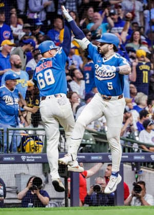 Milwaukee Brewers center fielder Garrett Mitchell (R) celebrates with Milwaukee Brewers third base coach Matt Erickson after hitting a two RBI home run in the sixth inning of the MLB, Baseball Herren, USA game between the Chicago Cubs and the Milwaukee Brewers at American Family Field in Milwaukee, Wisconsin on Friday, June 26, 2026.  MIL20260626824 TANNENxMAURY