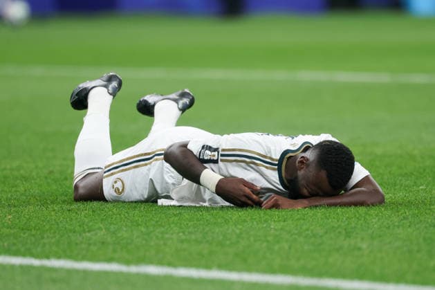 HOUSTON, TX - JUNE 26: Hassan Tambakti 5 of Saudi Arabia lays injured on the pitch during the FIFA World Cup, WM, Weltmeisterschaft, Fussball 2026 Group H match between Cabo Verde and Saudi Arabia on June 26, 2026, at Houston Stadium in Houston, Texas. (Photo by David Buono Icon Sportswire). SOCCER: JUN 26 FIFA World Cup 26 Group H - Cabo Verde vs Saudi Arabia EDITORIAL USE ONLY Icon260626033