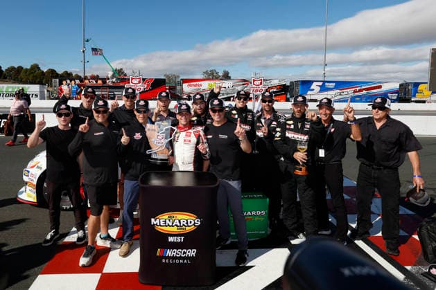 SONOMA, CA - JUNE 26: Sam Corry* ( 25 Bruce Toyota) celebrates with the trophy and his team after winning the General Tire 150 ARCA Menards Series West race on June 26, 2026, at Sonoma Raceway in Sonoma, CA. (Photo by Jeff Speer Sonoma Raceway Icon Sportswire) AUTO: JUN 26 ARCA Menards Series West General Tire 150 EDITORIAL USE ONLY Icon2606265956