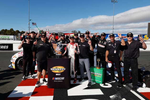 SONOMA, CA - JUNE 26: Sam Corry* ( 25 Bruce Toyota) celebrates with the trophy and his team after winning the General Tire 150 ARCA Menards Series West race on June 26, 2026, at Sonoma Raceway in Sonoma, CA. (Photo by Jeff Speer Sonoma Raceway Icon Sportswire) AUTO: JUN 26 ARCA Menards Series West General Tire 150 EDITORIAL USE ONLY Icon2606265971
