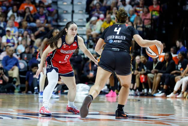 UNCASVILLE, CT - JUNE 26: Georgia Amoore 8 of the Washington Mystics defends Charlisse Leger-Walker 4 of the Connecticut Sun during the WNBA, Basketball Damen, USA game between Washington Mystics and Connecticut Sun on June 26, 2026, at Mohegan Sun Arena in Uncasville, CT. (Photo by M. Anthony Nesmith Icon Sportswire) WNBA: JUN 26 Washington Mystics at Connecticut Sun EDITORIAL USE ONLY Icon26062617
