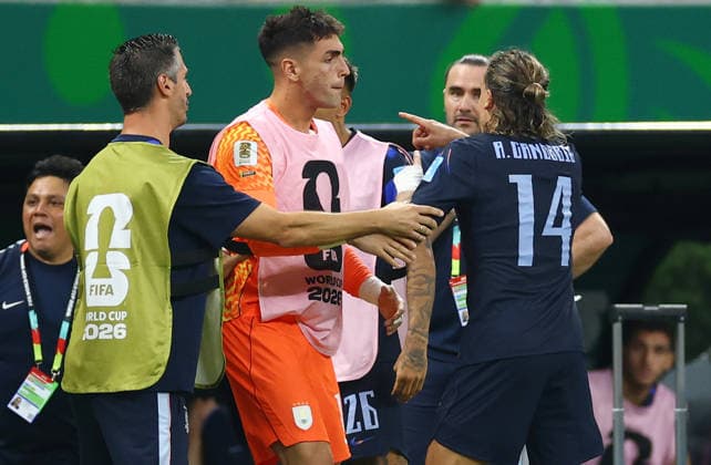 Uruguay s Agustin Canobbio (14) argues on the sideline after receiving a red card for his tackle on Spain s Pau Cubarsi in the second half of a FIFA World Cup, WM, Weltmeisterschaft, Fussball match at Guadalajara Stadium in Guadalajara, Mexico, on Friday, June 26, 2026.  GUA20260626826 CHRISTIANxBRUNSKILL