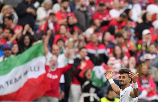 (260627) -- SEATTLE, June 27, 2026 -- Ramin Rezaeian of Iran celebrates his goal during the group G match between Egypt and Iran at the 2026 FIFA World Cup, WM, Weltmeisterschaft, Fussball at Seattle Stadium in Seattle, the United States, June 26, 2026. ) (SP)U.S.-SEATTLE-FOOTBALL-FIFA WORLD CUP-GROUP G-EGY VS IRN PengxZiyang 