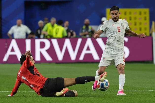 Mohamed Hany (L) of Egypt vies for the ball with Milad Mohammadi of Iran during a Group G match at the 2026 FIFA World Cup, WM, Weltmeisterschaft, Fussball between Egypt and Iran at Lumen Field in Seattle, United States, 26 June 2026. FIFA World Cup 2026 - Group G - Egypt vs Iran !ACHTUNG: NUR REDAKTIONELLE NUTZUNG!  Copyright: xOmarxAlonsox AME5099 20260627-55020725189_1