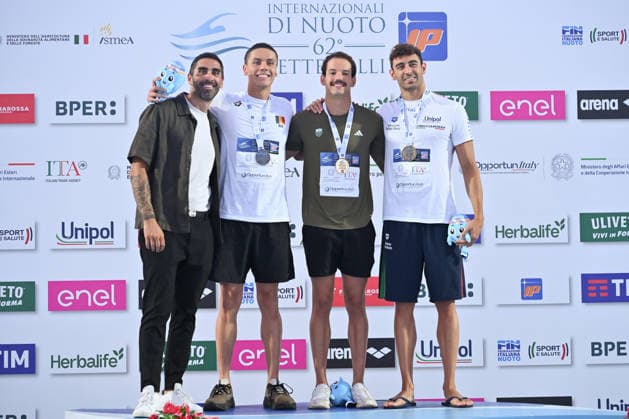 IPA86115033 - Filippo MAGNINI, David POPOVICI, Guilherme Santos Caribe and Leonardo Deplano during the medal ceremony for the men’s 50-meter freestyle on the first day of the 62nd Settecolli International Swimming Trophy at the Foro Italico in Rome on June 26, 2026.  Copyright: xDomenicoxCippitelli IPAxSportx xx 86115033