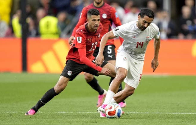 FIFA World Cup, WM, Weltmeisterschaft, Fussball 2026 - Group G - Egypt vs Iran Ahmed Fatouh (L) of Egypt and Saman Ghoddos of Iran in action during the FIFA World Cup 2026 group stage match Egypt against Iran, in Seattle, USA, 26 June 2026. SEATTLE United States  Copyright: xSTEPHENxBRASHEARx