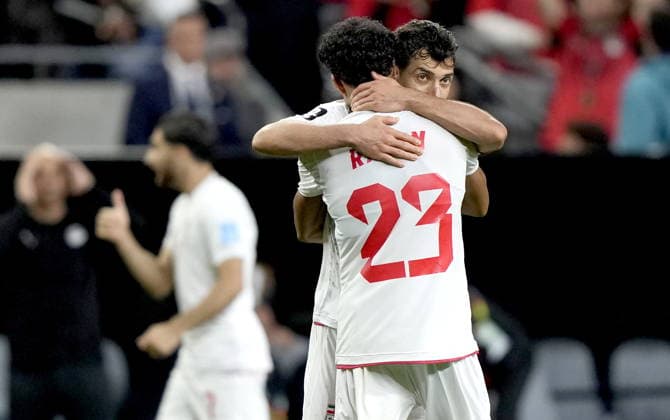 FIFA World Cup, WM, Weltmeisterschaft, Fussball 2026 - Group G - Egypt vs Iran Shojae Khalilzadeh (facing) and Ramin Rezaeian of Iran celebrate at the end of the FIFA World Cup 2026 group stage match Egypt against Iran, in Seattle, USA, 26 June 2026. The match ended 1-1. SEATTLE United States  Copyright: xSTEPHENxBRASHEARx