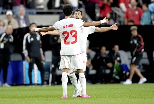 FIFA World Cup, WM, Weltmeisterschaft, Fussball 2026 - Group G - Egypt vs Iran Shojae Khalilzadeh (facing) and Ramin Rezaeian of Iran celebrate at the end of the FIFA World Cup 2026 group stage match Egypt against Iran, in Seattle, USA, 26 June 2026. The match ended 1-1. SEATTLE United States  Copyright: xSTEPHENxBRASHEARx