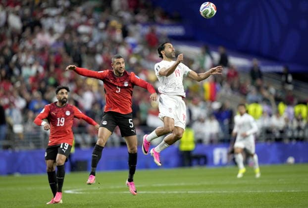 FIFA World Cup, WM, Weltmeisterschaft, Fussball 2026 - Group G - Egypt vs Iran Ramy Rabia(C) of Egypt and Saman Ghoddos (R) of Iran in action during the FIFA World Cup 2026 group stage match Egypt against Iran, in Seattle, USA, 26 June 2026. SEATTLE United States  Copyright: xSTEPHENxBRASHEARx