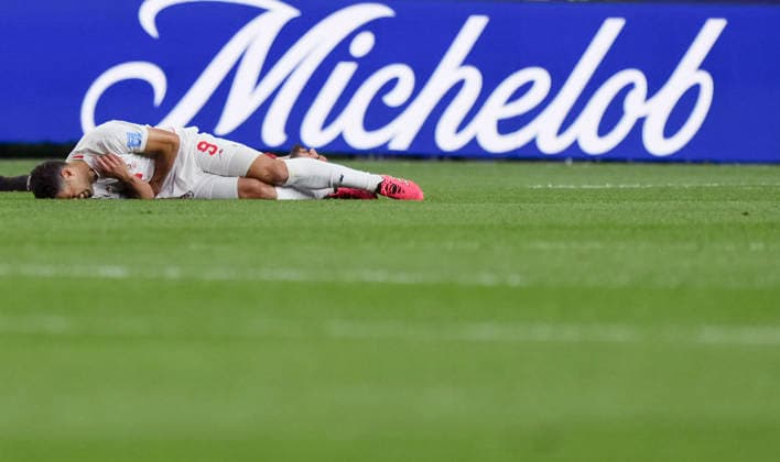 (260627) -- SEATTLE, June 27, 2026 -- Mehdi Taremi of Iran reacts after sustaining an injury during the group G match between Egypt and Iran at the 2026 FIFA World Cup, WM, Weltmeisterschaft, Fussball at Seattle Stadium in Seattle, the United States, June 26, 2026. ) (SP)U.S.-SEATTLE-FOOTBALL-FIFA WORLD CUP-GROUP G-EGY VS IRN PengxZiyang 