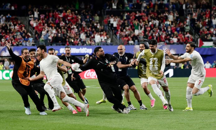 (260627) -- SEATTLE, June 27, 2026 -- Members of Iran celebrate a goal by Shoja Khalilzadeh (2nd L, front) that is later disallowed during the group G match between Egypt and Iran at the 2026 FIFA World Cup, WM, Weltmeisterschaft, Fussball at Seattle Stadium in Seattle, the United States, June 26, 2026. (Photo by Xinhua) (SP)U.S.-SEATTLE-FOOTBALL-FIFA WORLD CUP-GROUP G-EGY VS IRN ArthurxDong 
