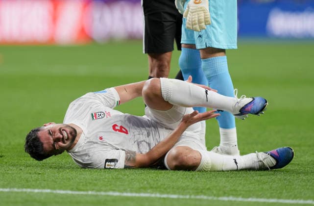 (260627) -- SEATTLE, June 27, 2026 -- Saeid Ezatolahi of Iran reacts after sustaining an injury during the group G match between Egypt and Iran at the 2026 FIFA World Cup, WM, Weltmeisterschaft, Fussball at Seattle Stadium in Seattle, the United States, June 26, 2026. ) (SP)U.S.-SEATTLE-FOOTBALL-FIFA WORLD CUP-GROUP G-EGY VS IRN PengxZiyang 