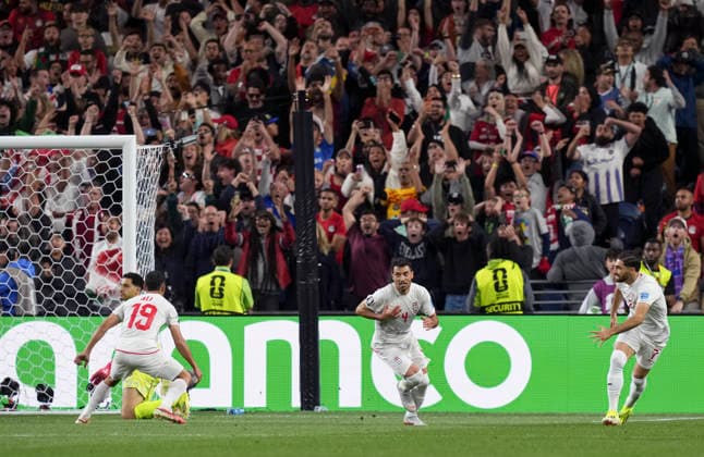 (260627) -- SEATTLE, June 27, 2026 -- Shoja Khalilzadeh (C) of Iran celebrates a goal that is later disallowed during the group G match between Egypt and Iran at the 2026 FIFA World Cup, WM, Weltmeisterschaft, Fussball at Seattle Stadium in Seattle, the United States, June 26, 2026. ) (SP)U.S.-SEATTLE-FOOTBALL-FIFA WORLD CUP-GROUP G-EGY VS IRN PengxZiyang 