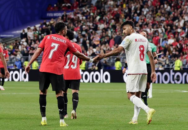 (260627) -- SEATTLE, June 27, 2026 -- Mahmoud Trezeguet (L) of Egypt interacts with Mohammad Mohebbi of Iran during the group G match between Egypt and Iran at the 2026 FIFA World Cup, WM, Weltmeisterschaft, Fussball at Seattle Stadium in Seattle, the United States, June 26, 2026. (Photo by Xinhua) (SP)U.S.-SEATTLE-FOOTBALL-FIFA WORLD CUP-GROUP G-EGY VS IRN ArthurxDong 