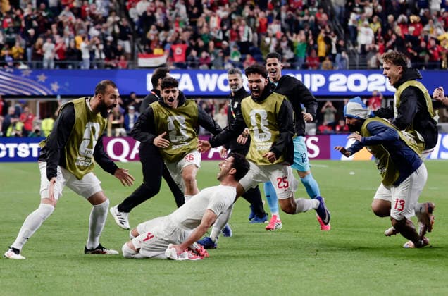 (260627) -- SEATTLE, June 27, 2026 -- Members of Iran celebrate a goal by Shoja Khalilzadeh (bottom) that is later disallowed during the group G match between Egypt and Iran at the 2026 FIFA World Cup, WM, Weltmeisterschaft, Fussball at Seattle Stadium in Seattle, the United States, June 26, 2026. (Photo by Xinhua) (SP)U.S.-SEATTLE-FOOTBALL-FIFA WORLD CUP-GROUP G-EGY VS IRN ArthurxDong 