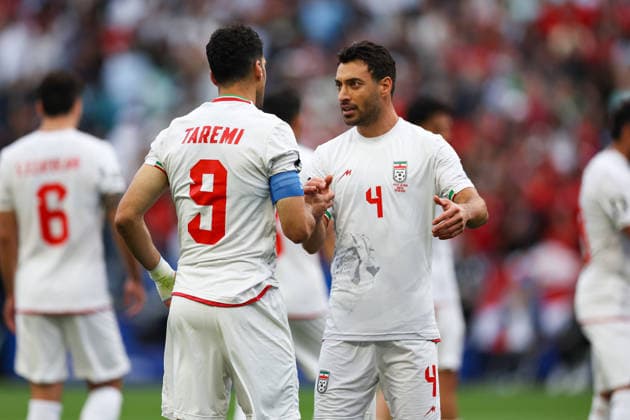 SEATTLE, WA - JUNE 26: Forward Mehdi Taremi 9 and defender Shoja Khalilzadeh 4 of IR Iran talk during the FIFA World Cup, WM, Weltmeisterschaft, Fussball 2026 Group G match between Egypt and IR Iran on June 26, 2026 at Seattle Stadium in Seattle, Washington. (Photo by Henry Rodenburg Icon Sportswire) SOCCER: JUN 26 FIFA World Cup 26 Group G - Egypt vs IR Iran EDITORIAL USE ONLY Icon260626013