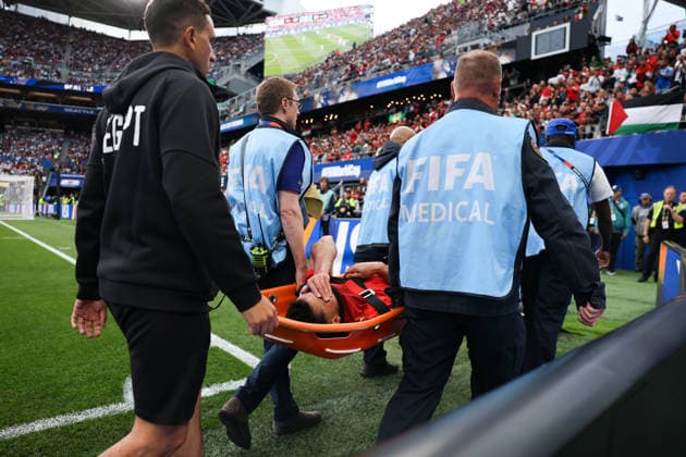 SEATTLE, WA - JUNE 26: Defender Mohamed Abdelmoneim 6 of Egypt is carried off the field during the FIFA World Cup, WM, Weltmeisterschaft, Fussball 2026 Group G match between Egypt and IR Iran on June 26, 2026 at Seattle Stadium in Seattle, Washington. (Photo by Henry Rodenburg Icon Sportswire) SOCCER: JUN 26 FIFA World Cup 26 Group G - Egypt vs IR Iran EDITORIAL USE ONLY Icon260626017
