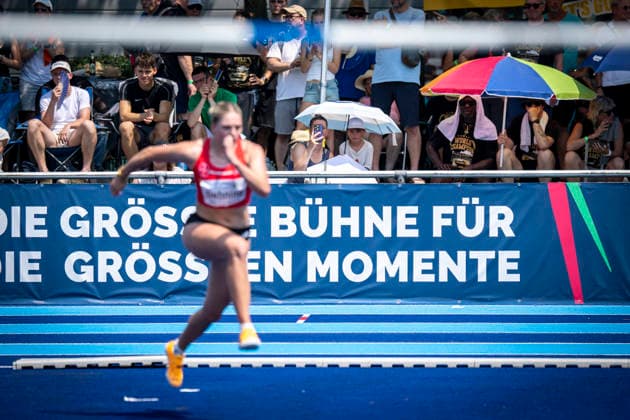 RATINGEN, GERMANY - JUNE 27, 2026 : Spectators with sun umbrella viewing Marie Dehning (GER Germany) competing during heptathlon’s high jump the Multisport Event at Stadion Ratingen on June 27, 2026 in Ratingen, Germany. Nordrhein-Westfalen Germany Copyright: xAxelxKohringx