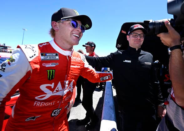 SONOMA, CA - JUNE 27: Ty Gibbs ( 54 Joe Gibbs Racing Saia Freight + Logistics Toyota) is congratulated by a crew member after capturing the pole for the NASCAR, Motorsport, USA Cup Series Toyota Save Mart 350 on June 27, 2026, at Sonoma Raceway in Sonoma, CA. (Photo by Will Lester Icon Sportswire) AUTO: JUN 27 NASCAR Cup Series Toyota Save Mart 350 EDITORIAL USE ONLY Icon26062711933