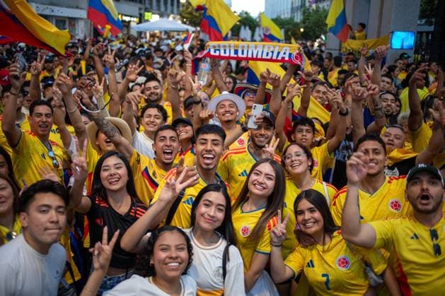 June 27, 2026, Madrid, Madrid, Spain: Colombian fans celebrate during a gathering of Colombians in Madrid..Dozens of Colombians living in Madrid gathered this afternoon on Madrid s Gran VoÂ­a to cheer on their national men s soccer team, which faces Portugal this Saturday (local time) at Hard Rock Stadium in Miami for the third match of the group stage of the 2026 FIFA World Cup, WM, Weltmeisterschaft, Fussball in the USA, Canada, and Mexico. Madrid Spain - ZUMAs197 20260627_aaa_s197_043 Copyright: xSOPAxImagesx