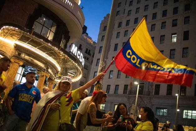 June 27, 2026, Madrid, Madrid, Spain: A woman waves a Colombian flag during a gathering of Colombian fans in Madrid..Dozens of Colombians living in Madrid gathered this afternoon on Madrid s Gran VoÂ­a to cheer on their national men s soccer team, which faces Portugal this Saturday (local time) at Hard Rock Stadium in Miami for the third match of the group stage of the 2026 FIFA World Cup, WM, Weltmeisterschaft, Fussball in the USA, Canada, and Mexico. Madrid Spain - ZUMAs197 20260627_aaa_s197_044 Copyright: xSOPAxImagesx