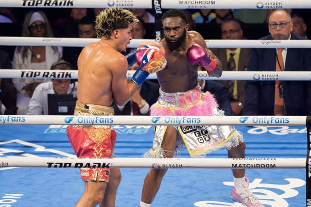 June 28, 2026, Brooklyn, New York, USA: XANDER ZAYAS (red trunks) battles JARON ENNIS in a bout for the WBO and WBA World Super-Welterweight titles at the Barclays Center in Brooklyn, New York. Brooklyn USA - ZUMAp109 20260628_zaf_p109_001 Copyright: xJoelxPlummerx